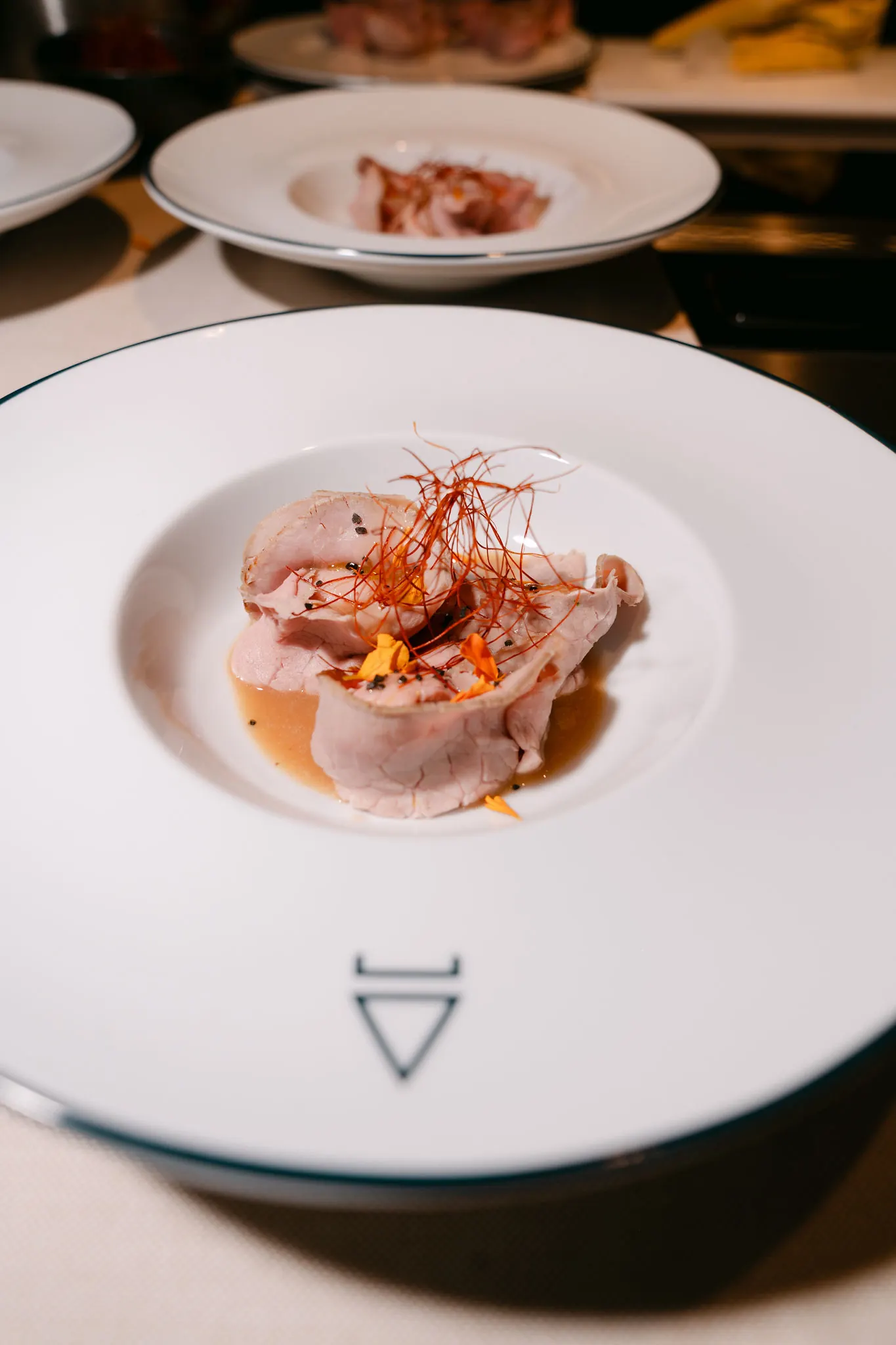 Gastronomic preparation in the ShangriLux suite.