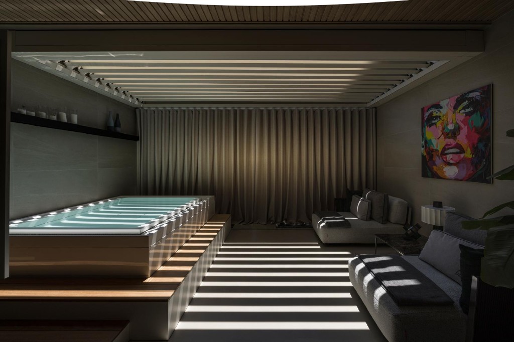 Wellness spa privata: idromassaggio, daybed e luce filtrata dal pergolato.